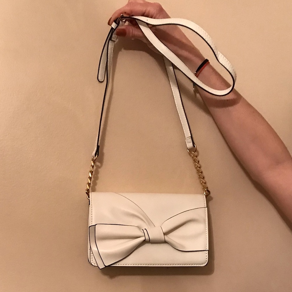 white cross body bag